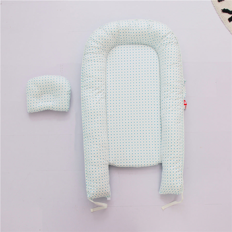 Nid réducteur de lit bébé avec coussinet ergonomique