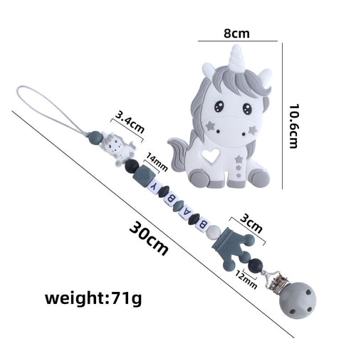 Attache tétine avec jouet