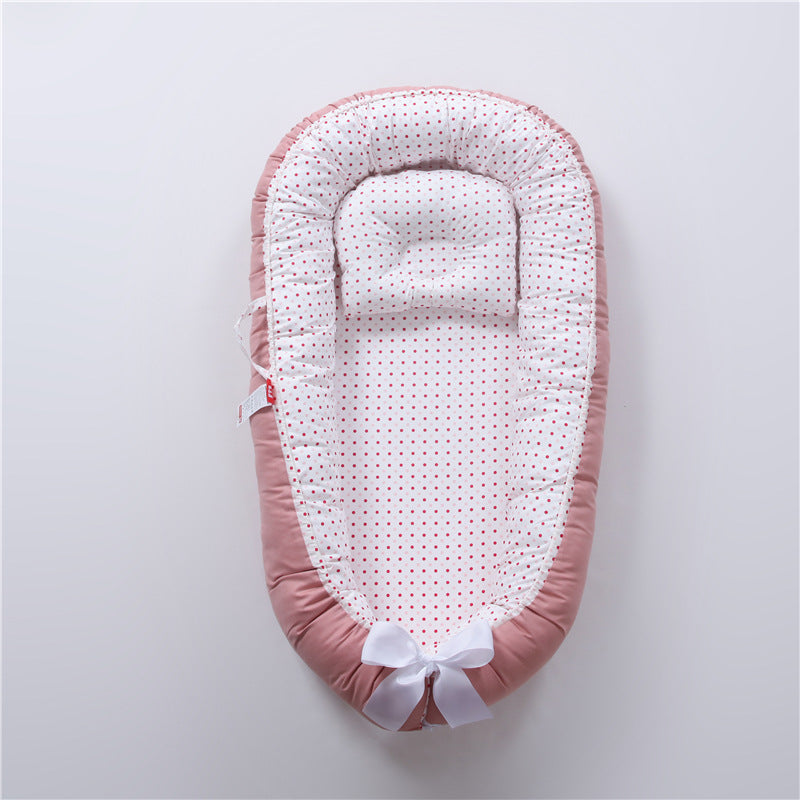 Nid réducteur de lit bébé avec coussinet ergonomique
