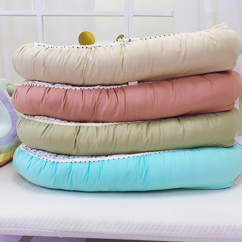 Nid réducteur de lit bébé avec coussinet ergonomique
