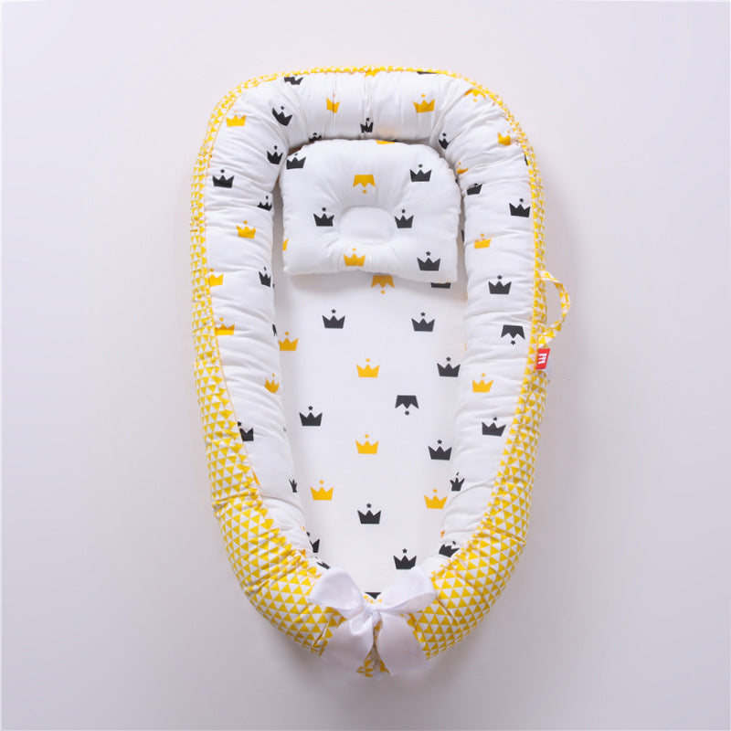 Nid réducteur de lit bébé avec coussinet ergonomique
