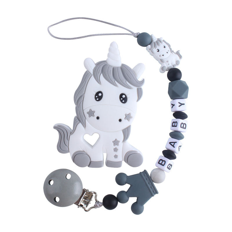 Attache tétine avec jouet