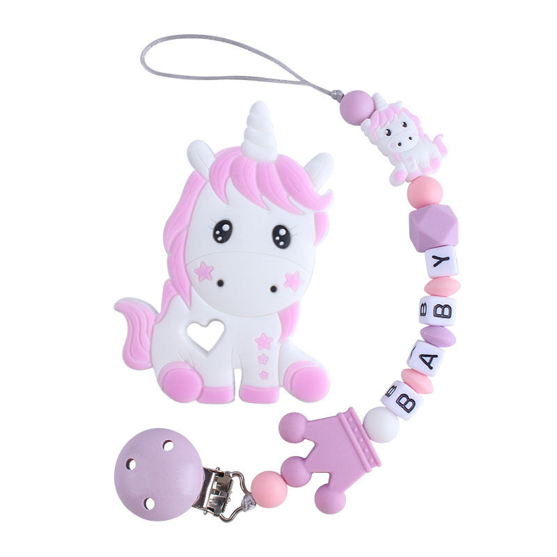 Attache tétine avec jouet